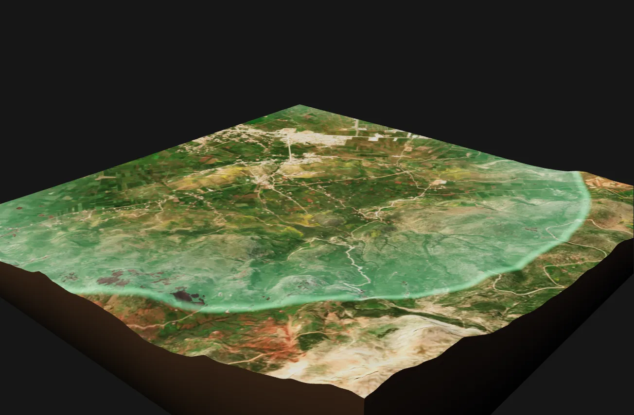 Terrain where an irrigated plain meets the foothills: fields on the plain rising to the mountain slopes, from Copernicus elevation and Sentinel-2 imagery.